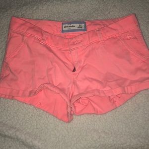 Bright pink Abercrombie shorts.